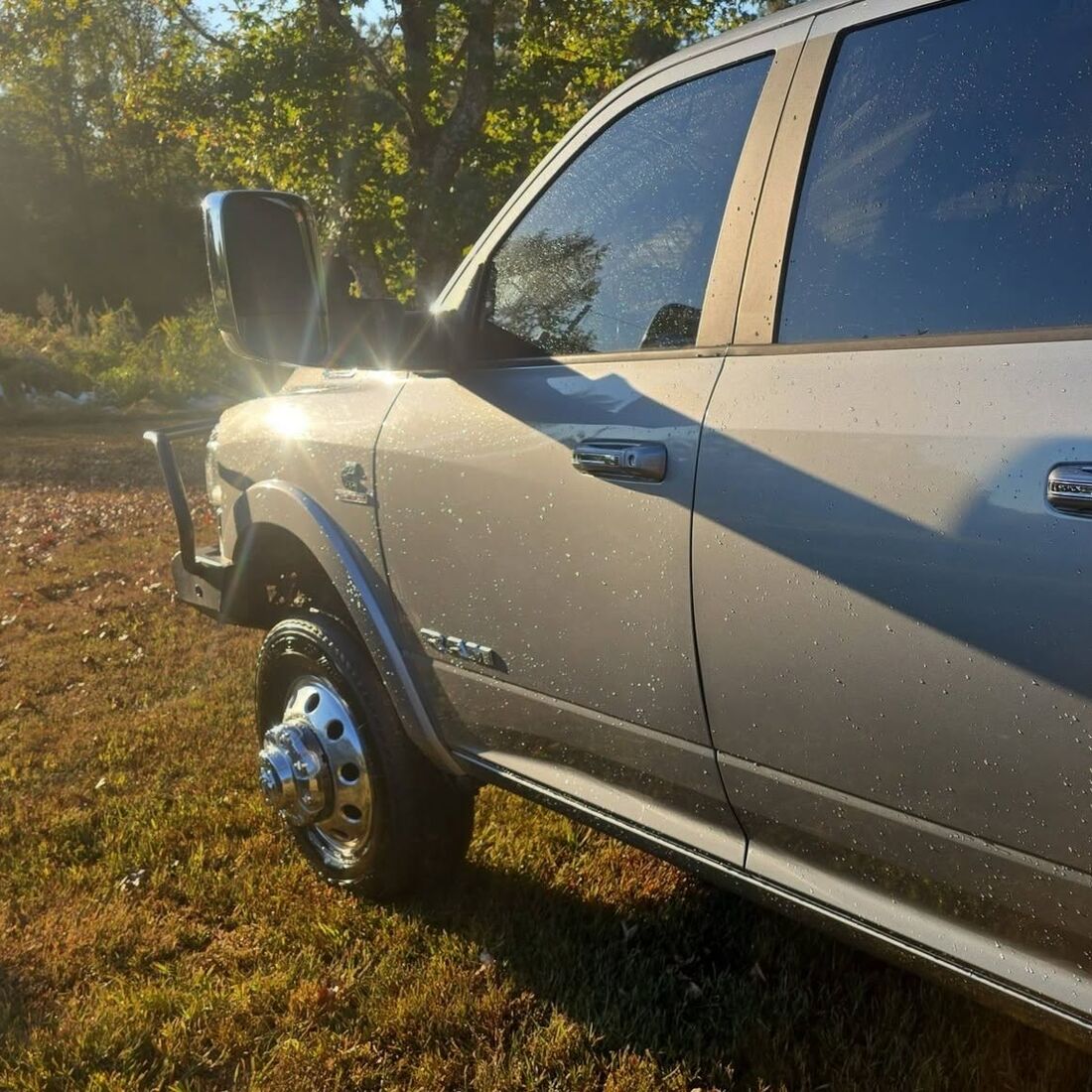Grey Ram 3500 dually, freshly washed, in the evening sun